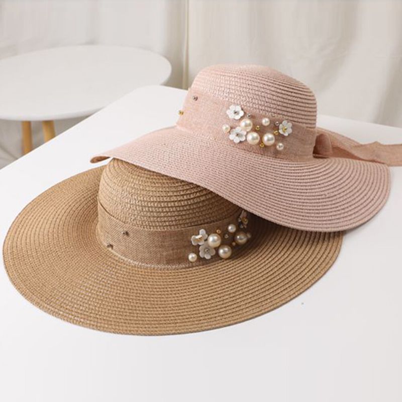 Femmes Paille Couleur Unie Élégant Grand Bord Perle Nœud Papillon Bord Ondulé Visière Chapeau De Soleil Chapeau De Plage Chapeau Seau