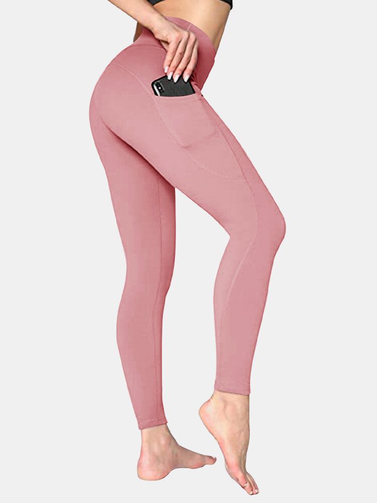 Legging De Yoga Sport Avec Poche Latérale De Couleur Unie Pour Femmes