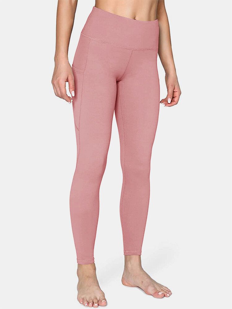 Legging De Yoga Sport Avec Poche Latérale De Couleur Unie Pour Femmes