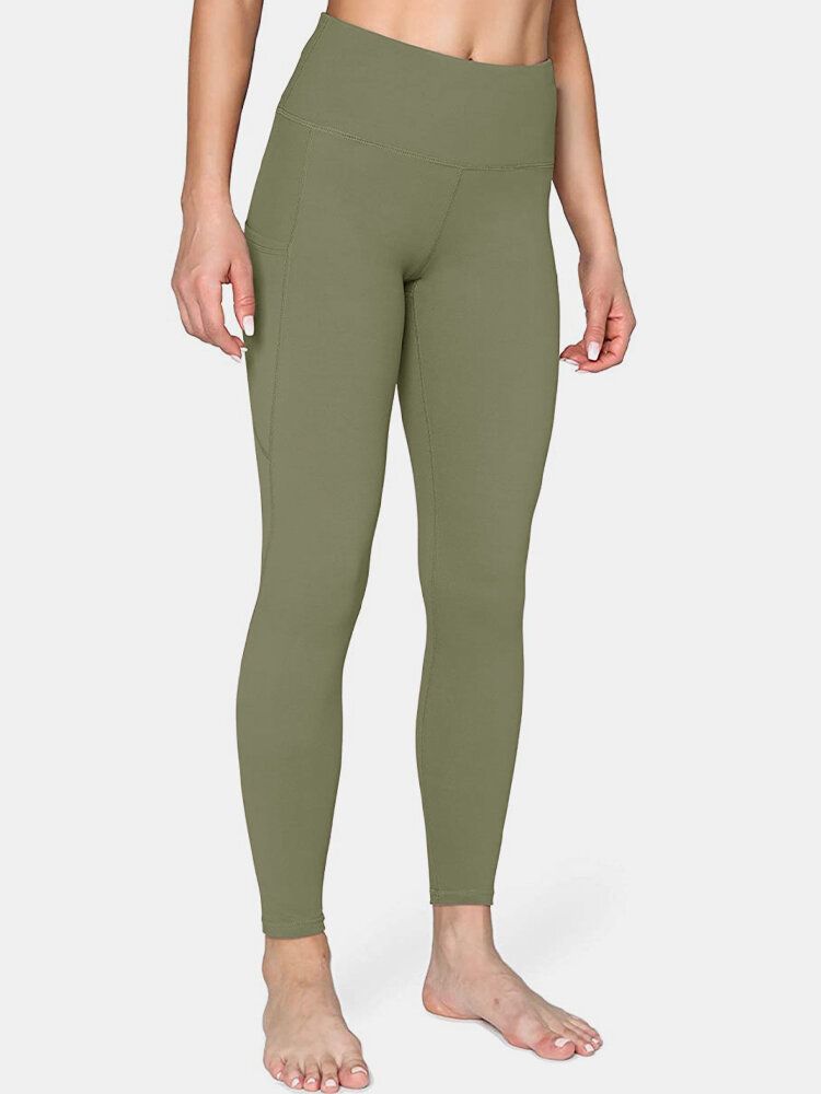 Legging De Yoga Sport Avec Poche Latérale De Couleur Unie Pour Femmes