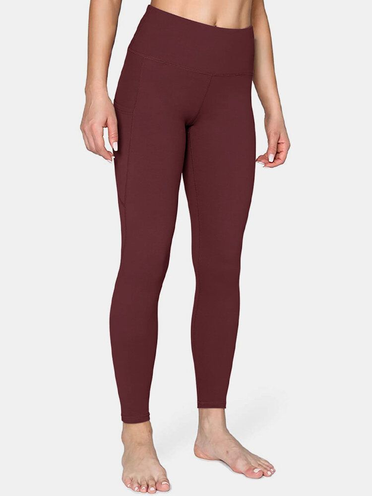 Legging De Yoga Sport Avec Poche Latérale De Couleur Unie Pour Femmes