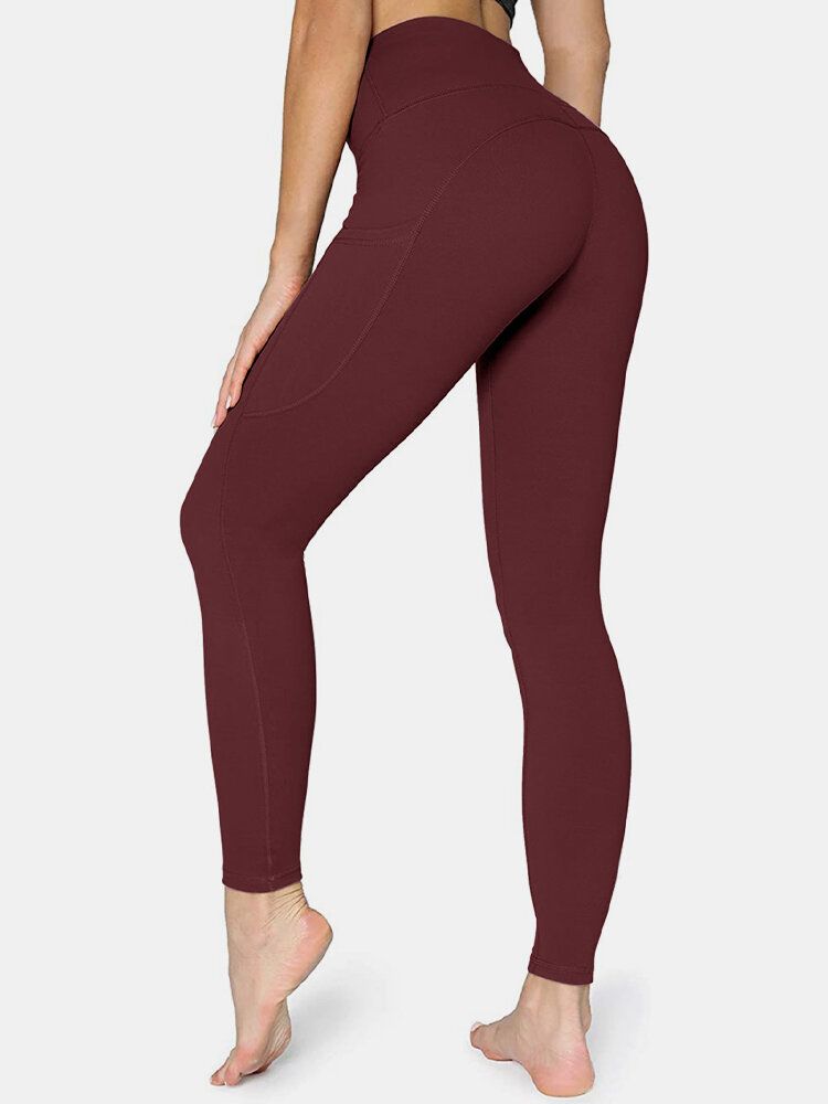 Legging De Yoga Sport Avec Poche Latérale De Couleur Unie Pour Femmes