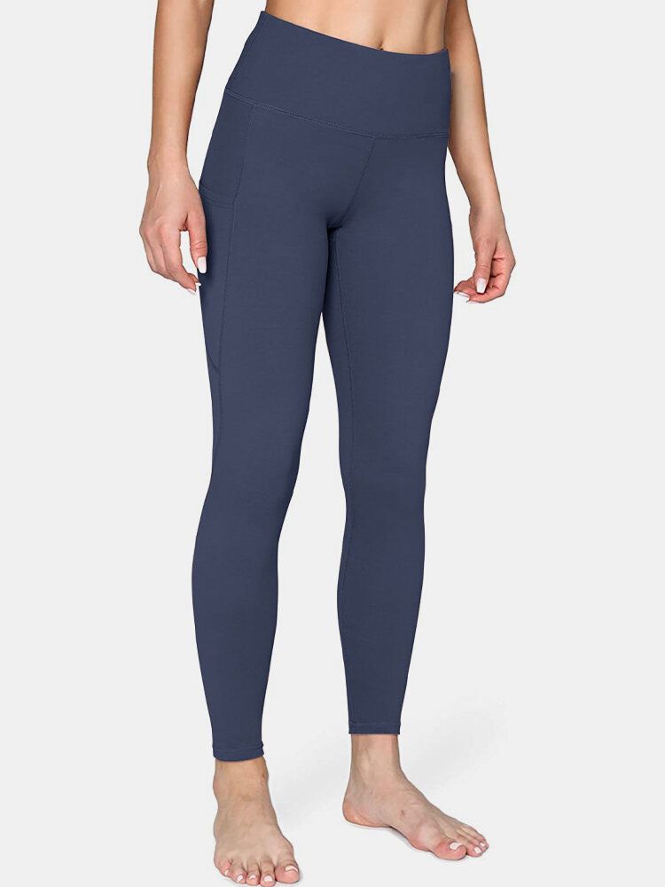 Legging De Yoga Sport Avec Poche Latérale De Couleur Unie Pour Femmes