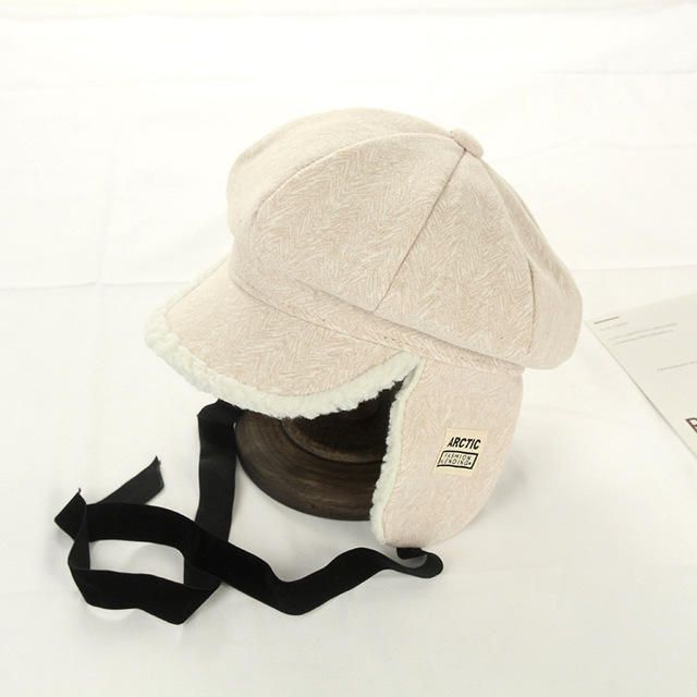 Nouveau Chapeau En Tricot Femme Patch Sauvage Épais Agneau Cachemire Chaud Voyage En Plein Air Protection Des Oreilles Lei Feng Chapeau