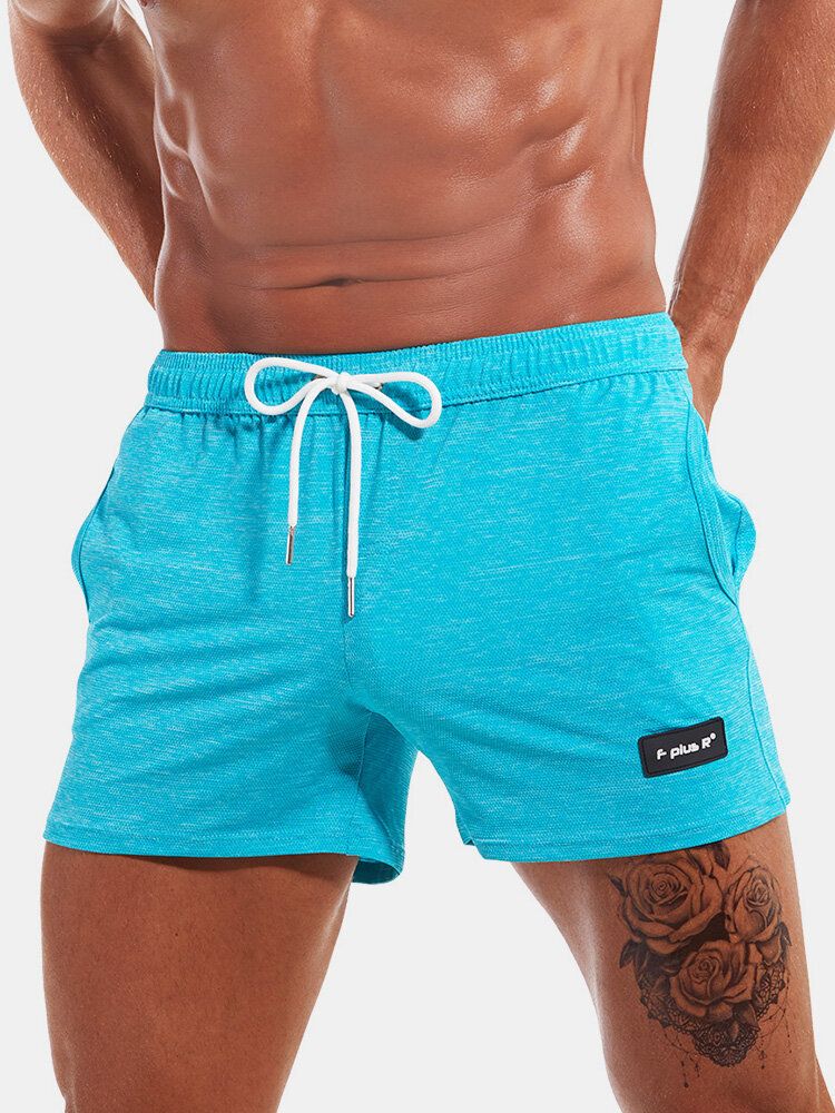 Short De Sport À Cordon De Serrage Avec Poche À Séchage Rapide De Couleur Unie Pour Hommes