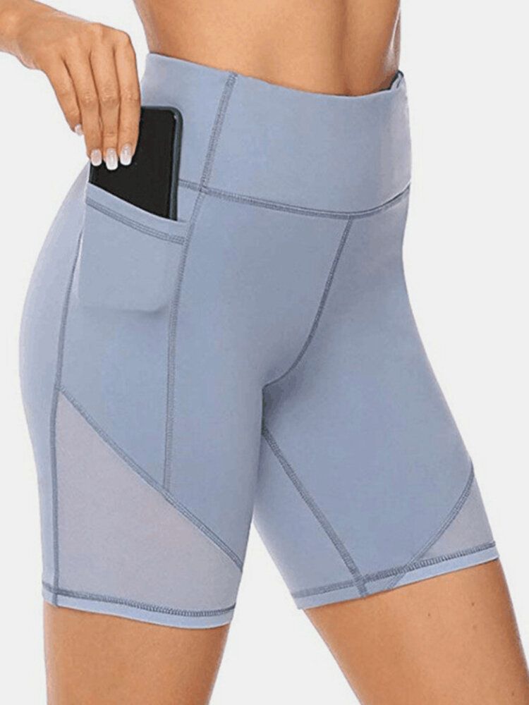 Short De Sport De Motard De Couleur Unie Pour Femmes De Grande Taille À Séchage Rapide Avec Poche