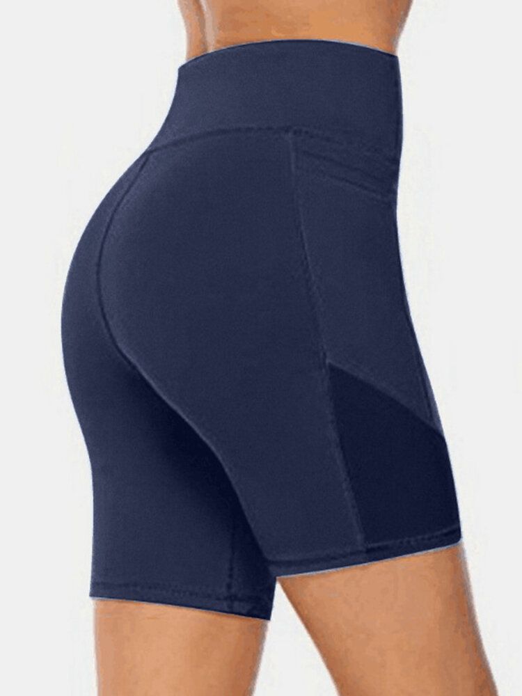 Short De Sport De Motard De Couleur Unie Pour Femmes De Grande Taille À Séchage Rapide Avec Poche