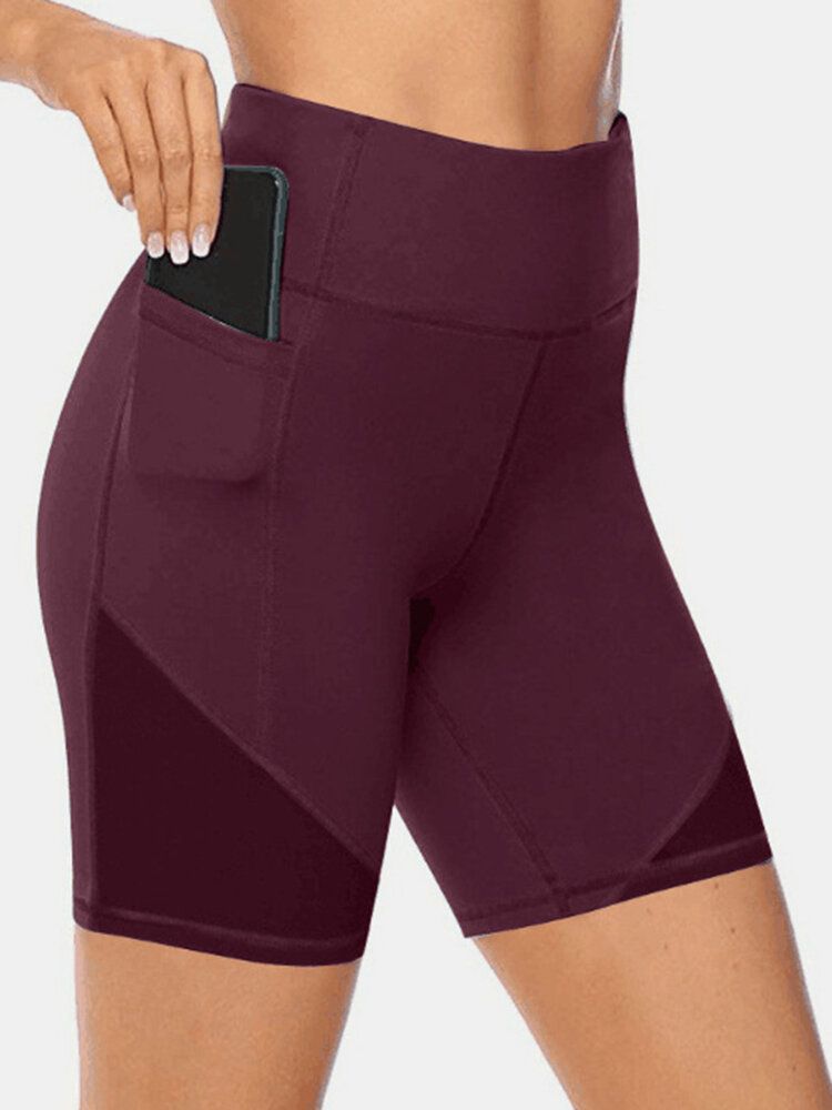 Short De Sport De Motard De Couleur Unie Pour Femmes De Grande Taille À Séchage Rapide Avec Poche