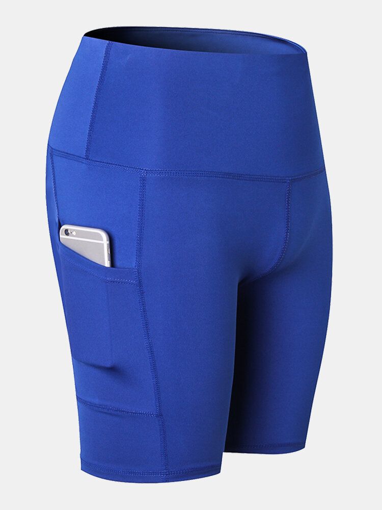 Short De Sport De Yoga À Séchage Rapide De Couleur Unie Pour Femmes Avec Poche Latérale