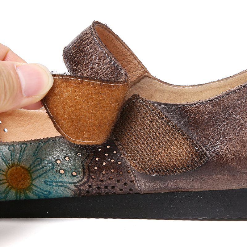 Socofy Retro Leather Embossed Flower Hollow Round Toe Comfy Soft Sole Flat Shoes