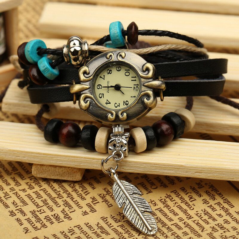 Style Rétro Vintage Cuir De Vachette Multicouche Montre À Quartz Armure Plume Pendentif Bracelet En Cuir Montre