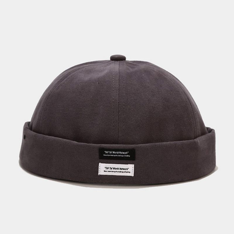 Unisexe Coton Couleur Unie Lettre Tissu Étiquette Tout Match Sans Bord Bonnet Propriétaire Casquette Tête De Mort