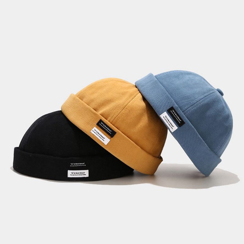 Unisexe Coton Couleur Unie Lettre Tissu Étiquette Tout Match Sans Bord Bonnet Propriétaire Casquette Tête De Mort