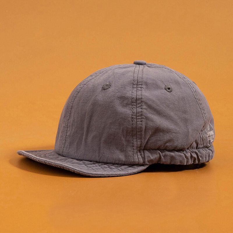 Unisexe Couleur Unie Court Bord Snapback Chapeau Décontracté Sauvage Bande Élastique Casquette De Baseball