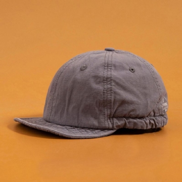 Unisexe Couleur Unie Court Bord Snapback Chapeau Décontracté Sauvage Bande Élastique Casquette De Baseball