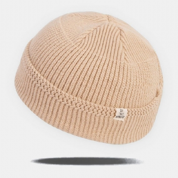 Unisexe Couleur Unie Élastique Tricoté Casquettes Automne Hiver Chaud Respirant Crâne Casquette Sans Bord Bonnet Propriétaire Casquette